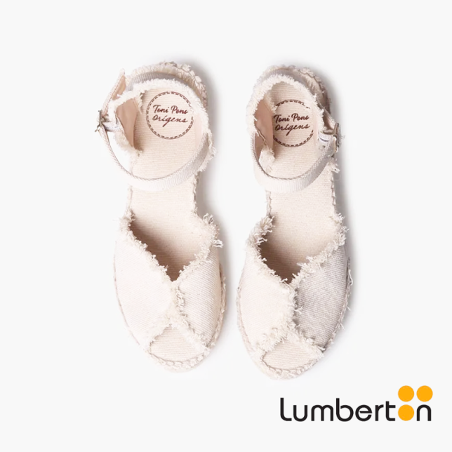 Sandalia blanca de cuña + detalle en...