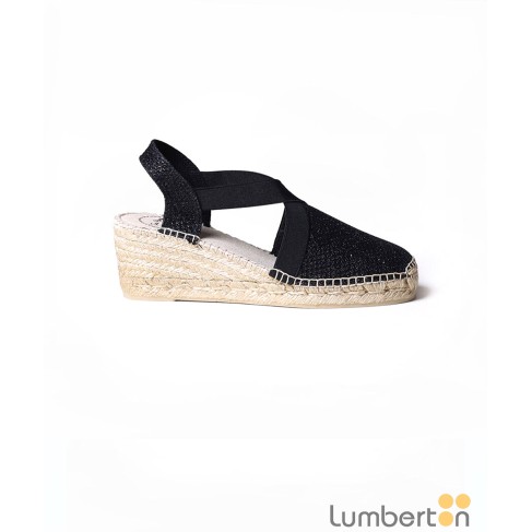 Sandalia negra brillo cuña...