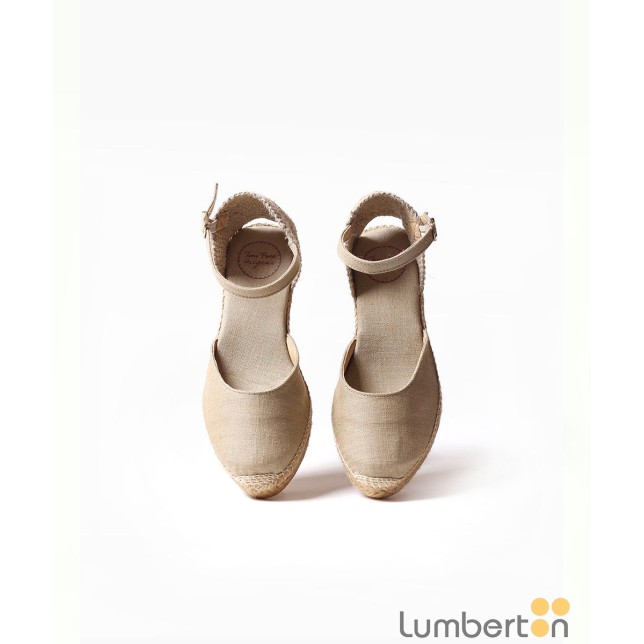 Sandalia beig tela cuña alta esparto...