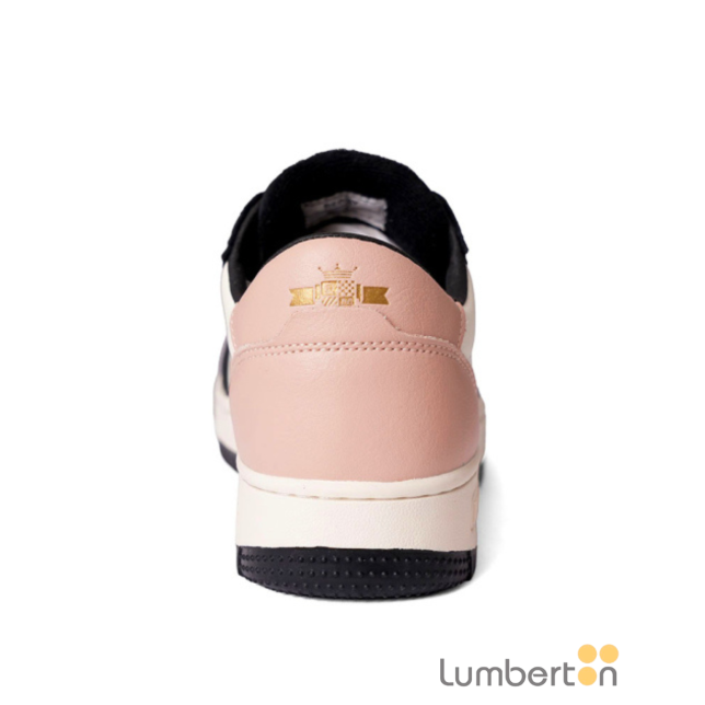 Zapatilla blanca, negra y rosa...