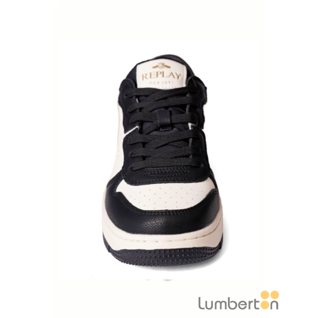 Zapatilla blanca, negra y rosa...