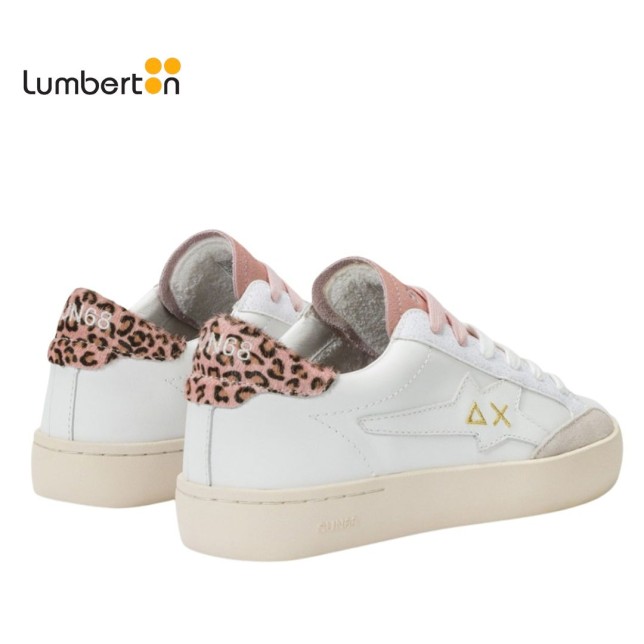 Zapato blanco con detalles rosa palo...